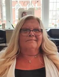 Anna M. Smith (1956-2026)